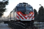 Inbound commuter prepares to shove out of its station stop